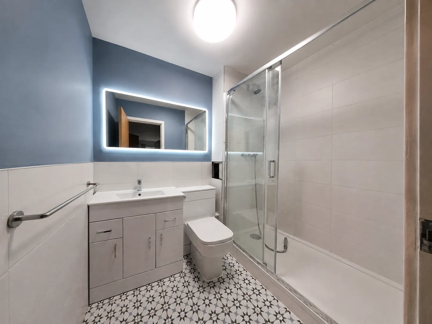 Bathroom tiling finished to the ceiling in an Edinburgh flat